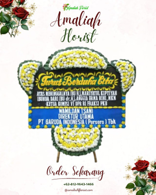 Papan Bunga Duka di Moyo Utara