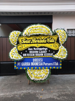 Papan Bunga Duka di Moyo Utara